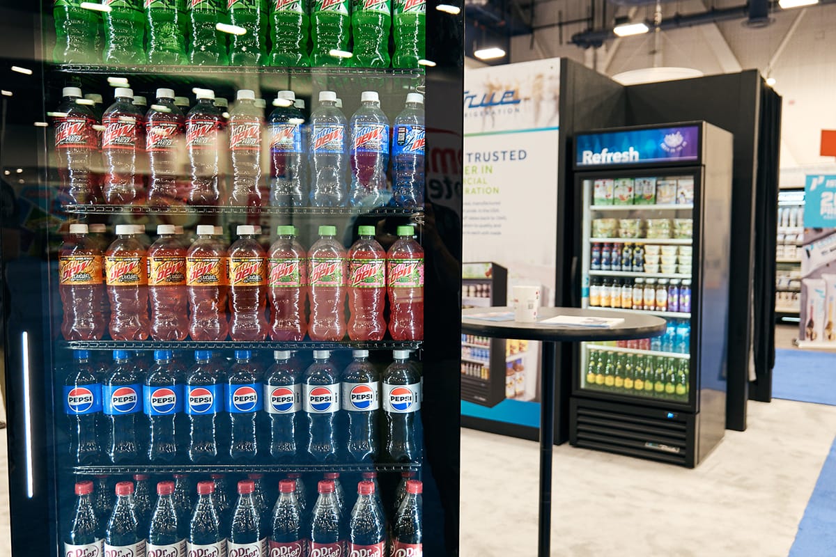 A vending machine stocked with a variety of beverages.